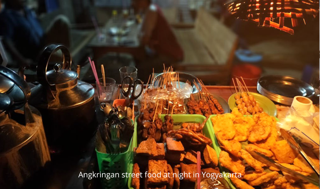 Angkringan street food at night in Yogyakarta